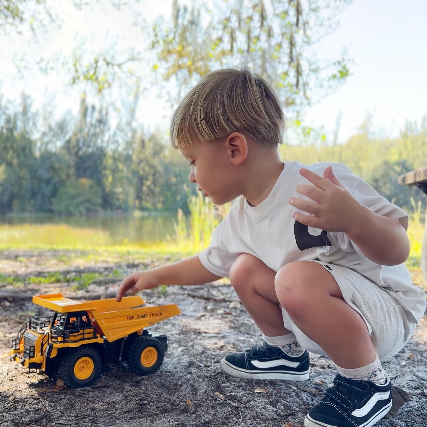 KIDDITOY 9-Channel RC Dump Truck Toy | 1:18 Scale, Lights & Sounds, All-Terrain Tires, 100-Min Rechargeable Battery – STEM Gift