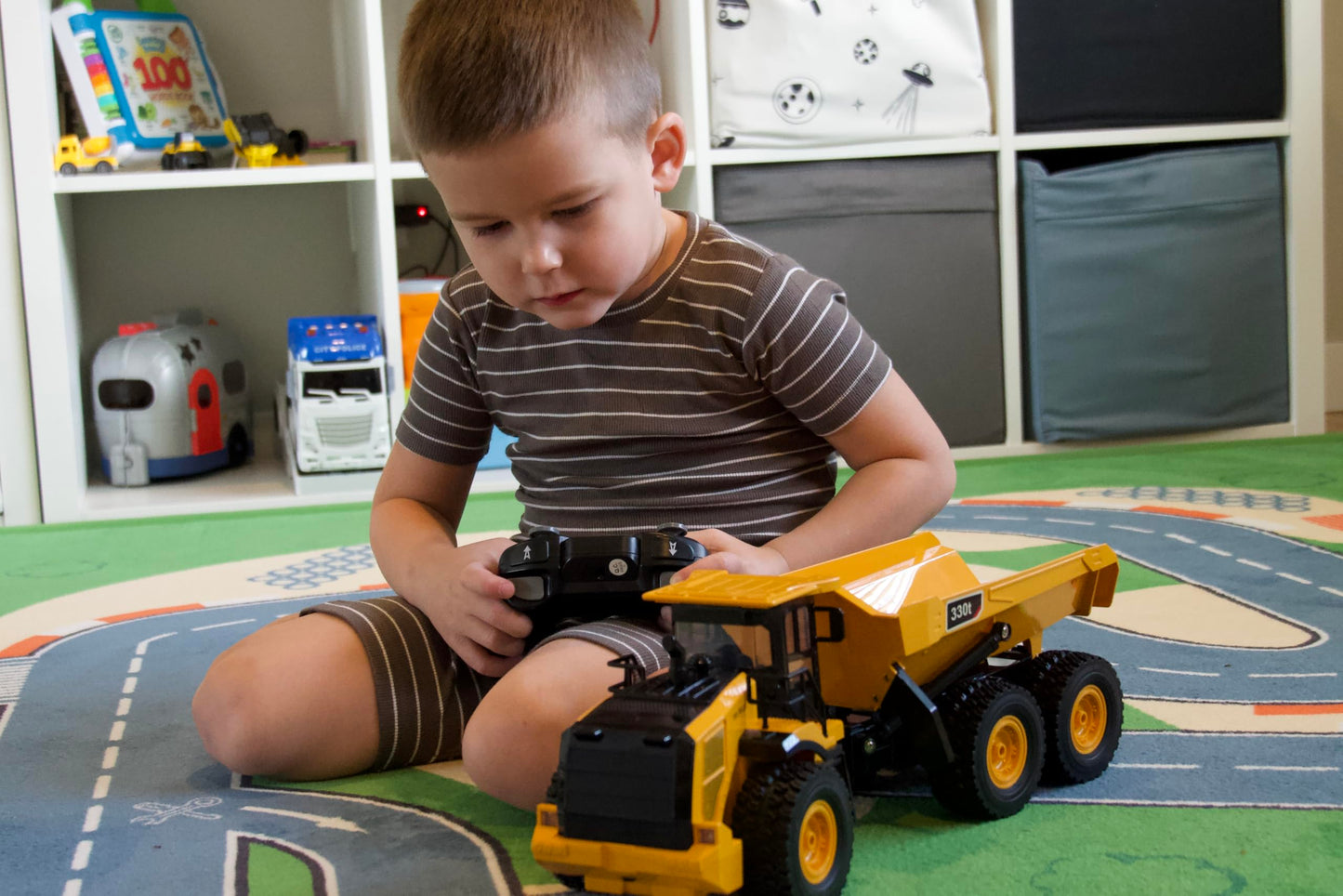 KIDDITOY Mighty 9-Channel RC Dump Truck Toy — 1:18 All-Terrain with Lights & Sounds