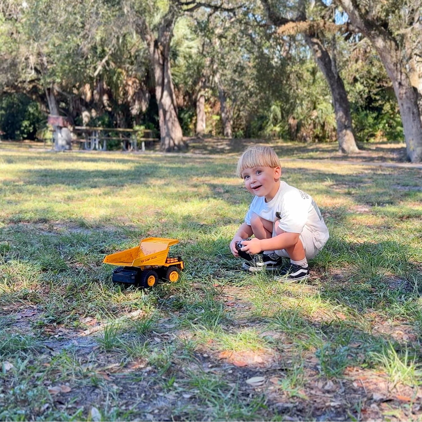 KIDDITOY 9-Channel RC Dump Truck Toy | 1:18 Scale, Lights & Sounds, All-Terrain Tires, 100-Min Rechargeable Battery – STEM Gift