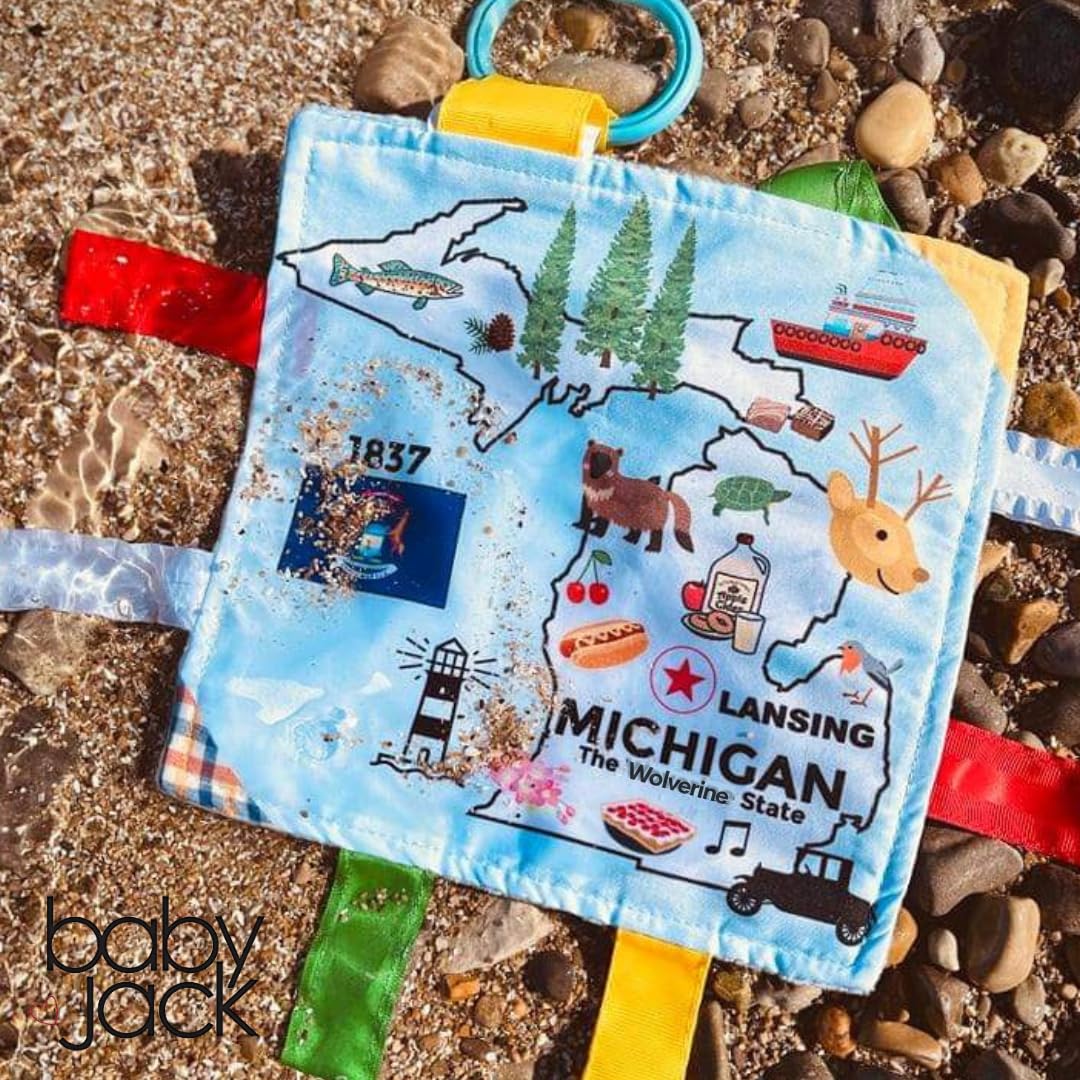 The Learning Lovey Michigan State Tag Stroller Toy — 8x8” Crinkle Sensory Baby Toy with BPA-Free Clip