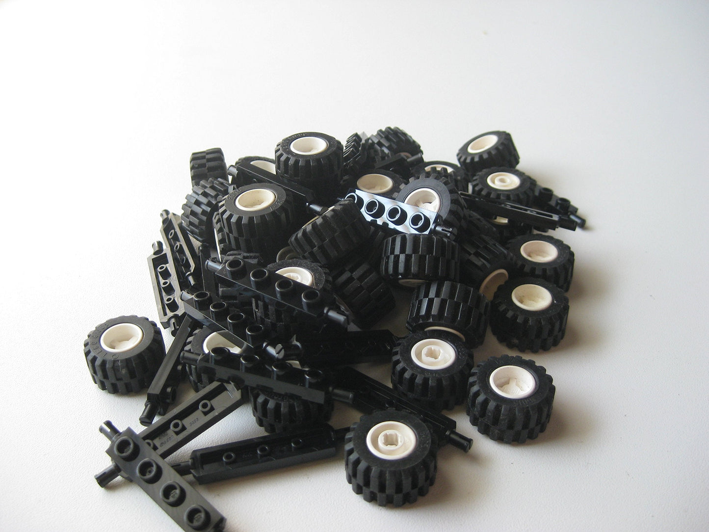 LEGO City Complete Wheel Assembly Lot – 20 Black Axles, 40 Black Tires, 40 White Hubs