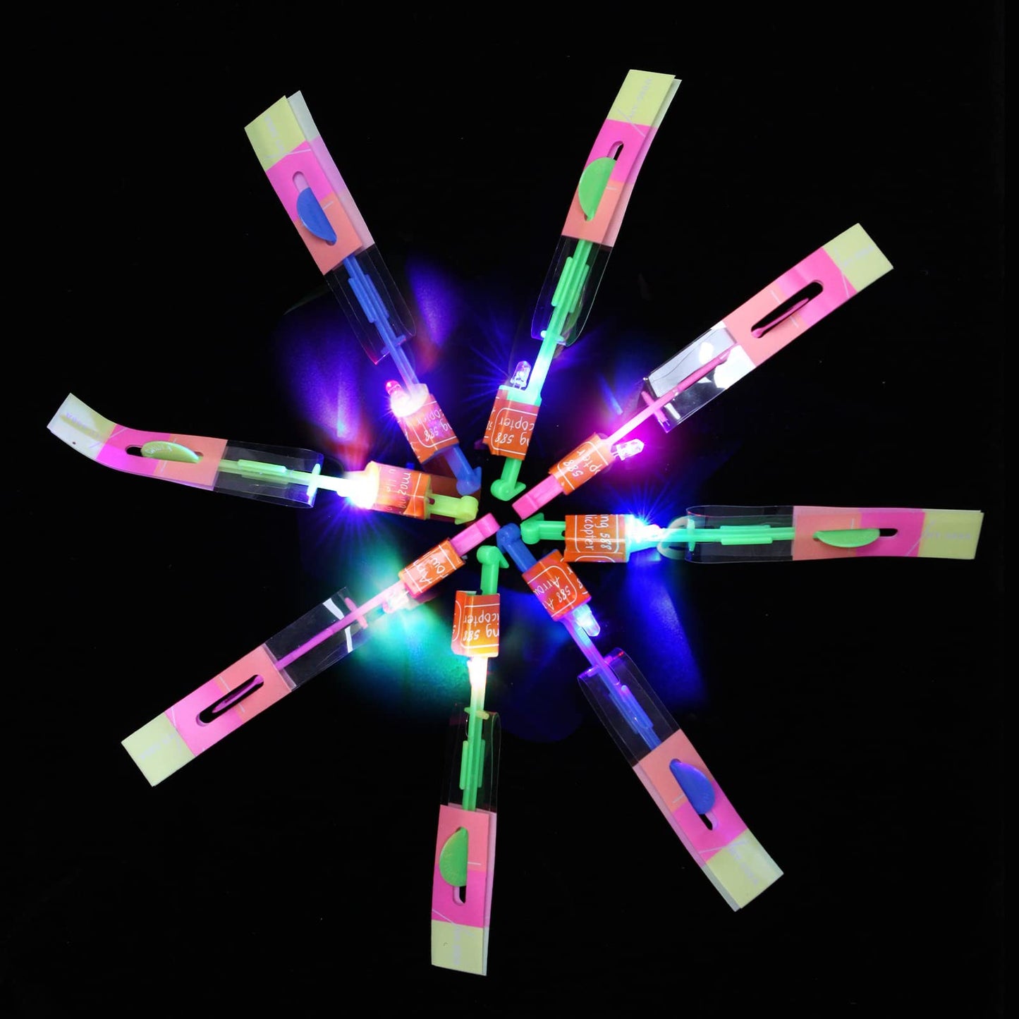 lpvoqpth 25 Sets LED Flying Set – 50 Glow Helicopters & Slingshots for Outdoor Night Fun