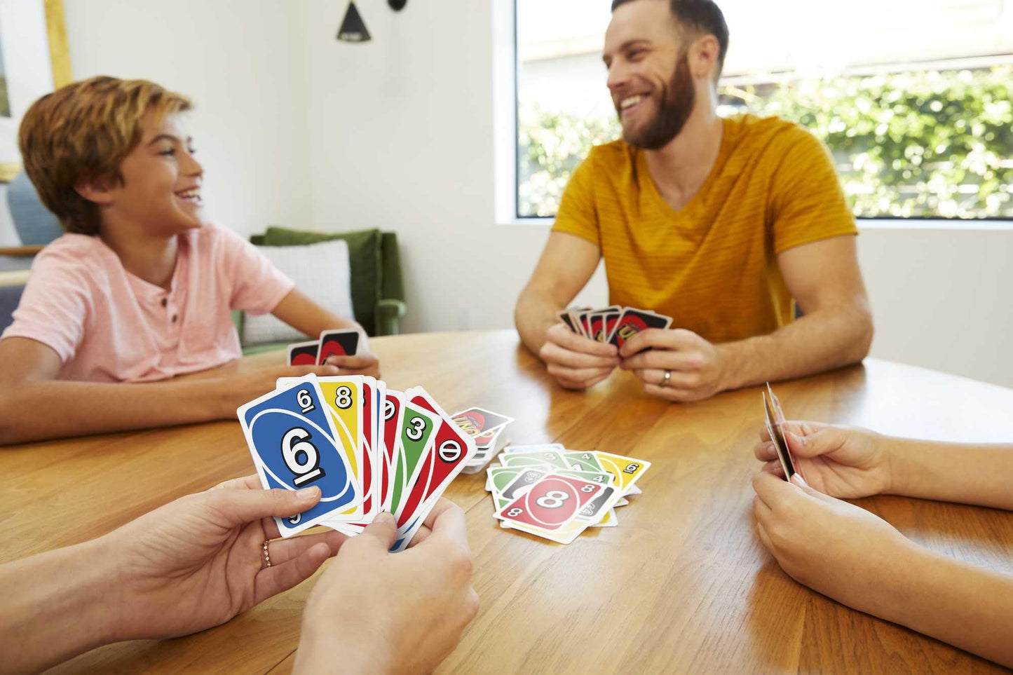 Mattel Games UNO Left-Handed Card Game in Collectible Tin | Family Night