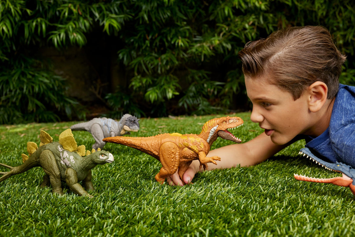 Mattel Jurassic World Wild Roar Megalosaurus: 11-Inch Action Figure with Sound, Spin-Wheel Attack & AR Play