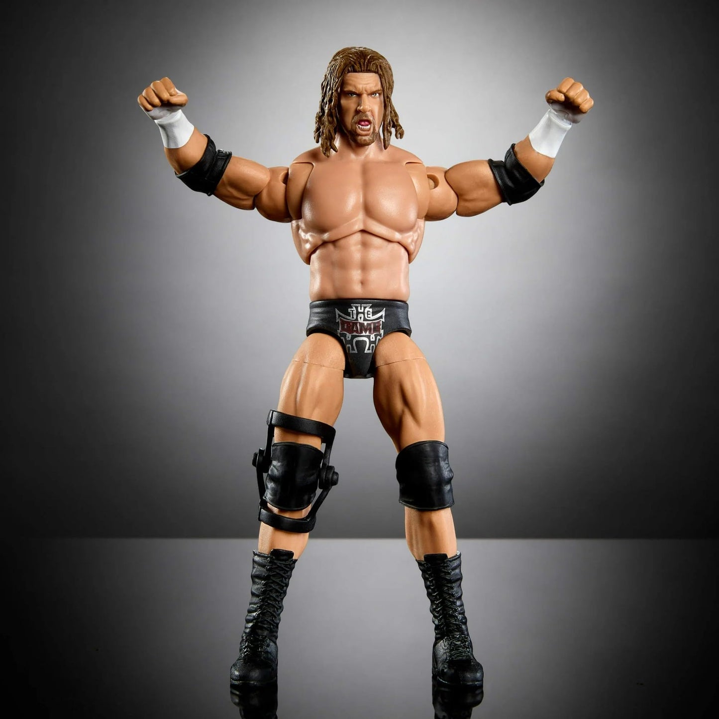 Mattel WWE Ultimate Edition Triple H Action Figure with Build-a-Figure Parts