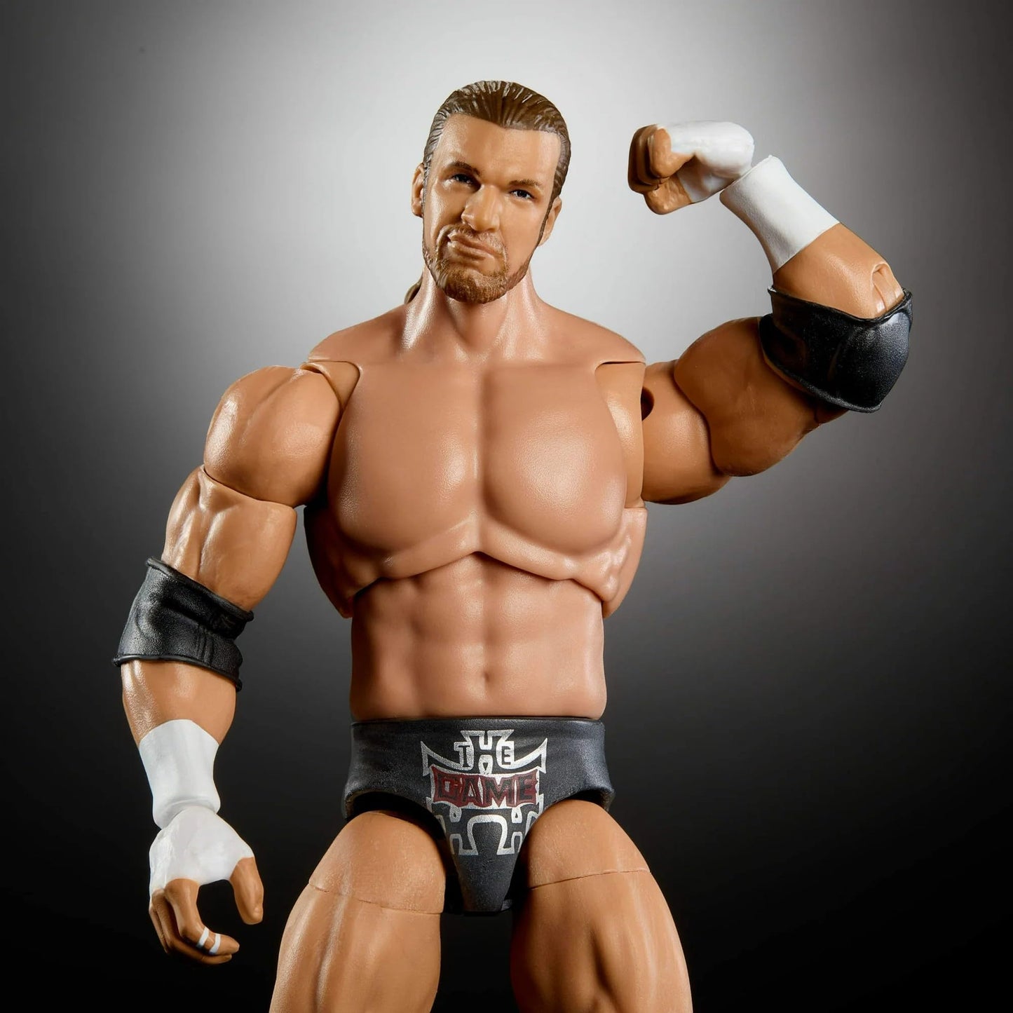 Mattel WWE Ultimate Edition Triple H Action Figure with Build-a-Figure Parts