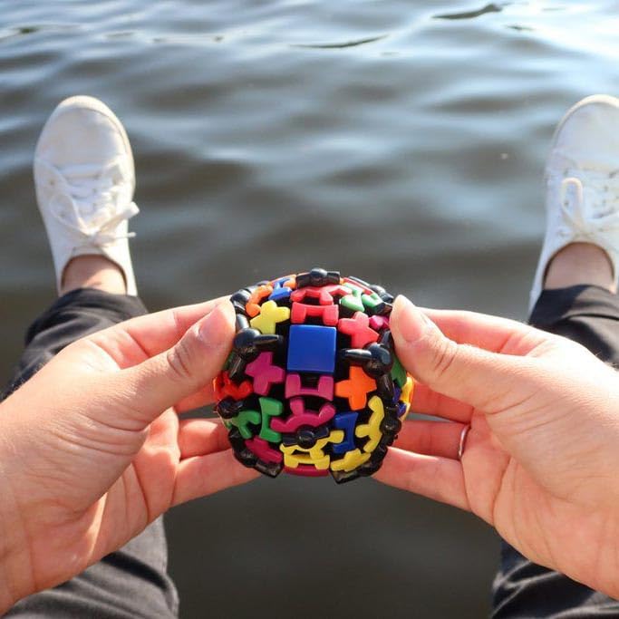 Meffert's Gear Ball – The Original Spinning 3D Brainteaser for Travel