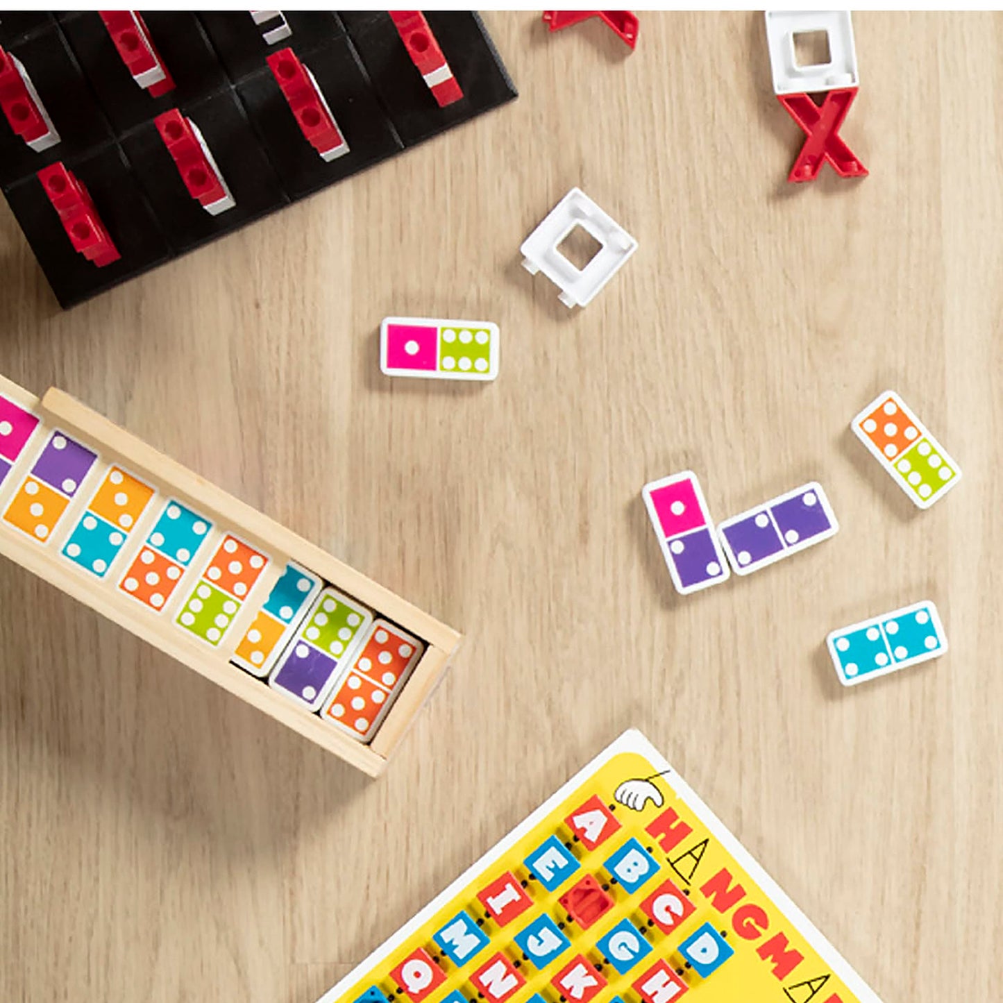 Melissa & Doug Dominoes Tabletop Game – 28 Colorful Tiles in Wooden Storage Box