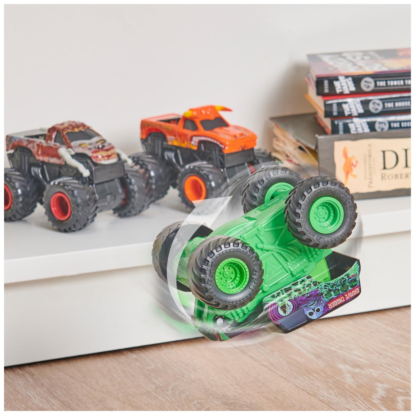 Monster Jam 1:43 Click & Flip Grave Digger & El Toro Loco 2-Pack – Front Flip Monster Trucks