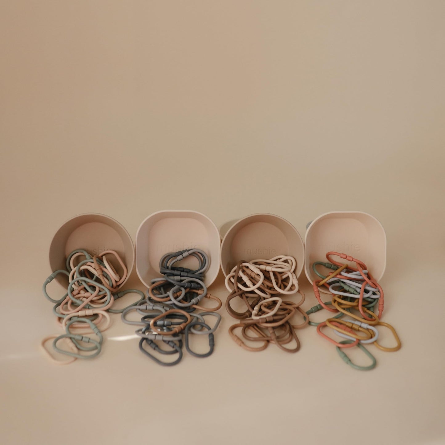 Mushie Chain Link Rings Toy 12-Pack – Car Seat & Stroller Attachments (Periwinkle, Mustard, Green, Coral)