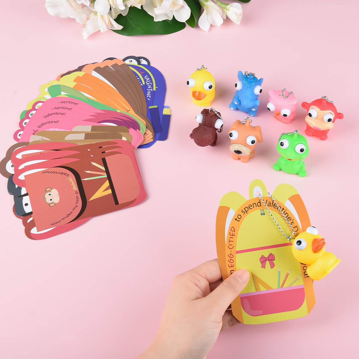 NUJOVI 28-Piece Valentine Cards with Pop-Eye Keychains for Kids