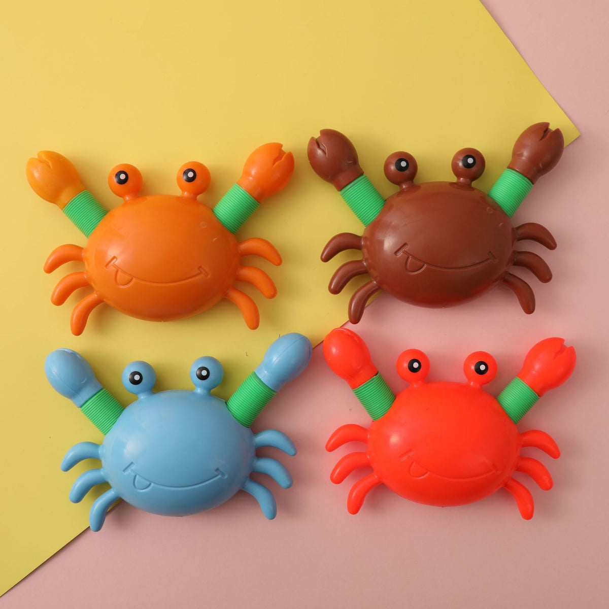 12pc Crabs with extending pipe legs. light up