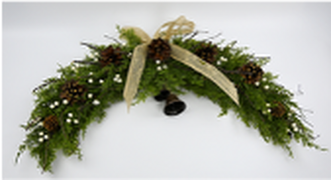 Arc Swag with White Berries, Pinecones with Bells and Bow Detail