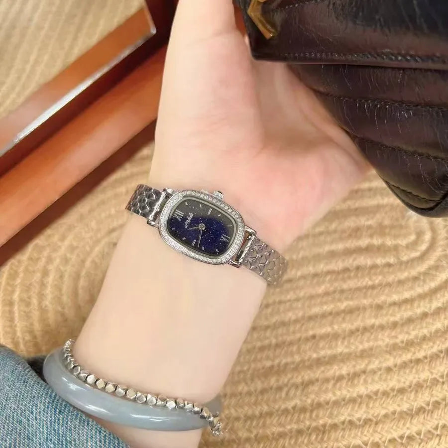Gold Diamond Embedded Quartz Watch Elliptical Dial Starry Sky Ladies Fashionable Stainless Steel Strap Butterfly Buckle Clasp
