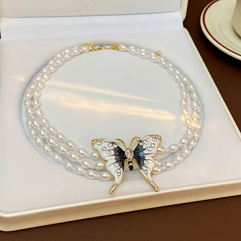 Vacation Classic Style Butterfly Imitation Pearl Alloy Beaded Chain Beaded Necklaces Wholesale