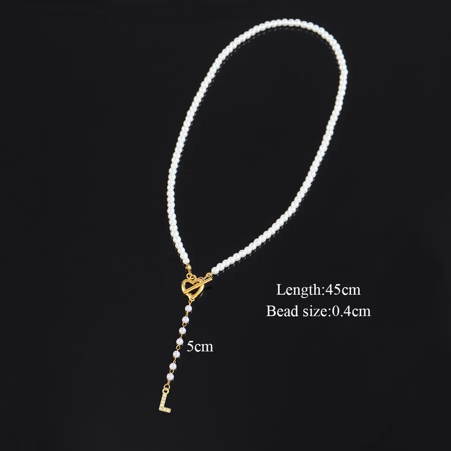 Elegant Classic Style Letter Heart Shape Artificial Pearl Copper Beaded Chain OT Clasp Toggle Clasp Closure Beaded Necklaces Wholesale