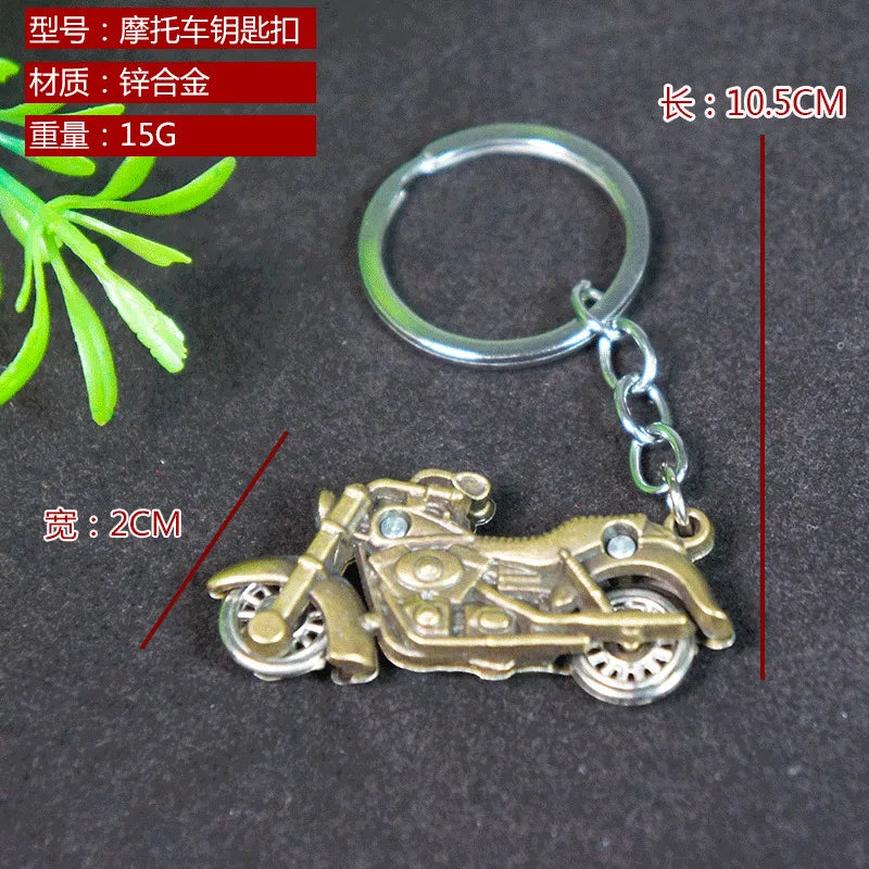 Factory sales metal simulation shell pistol tank aircraft hammer Bell ear spoon keychain uncle souvenir