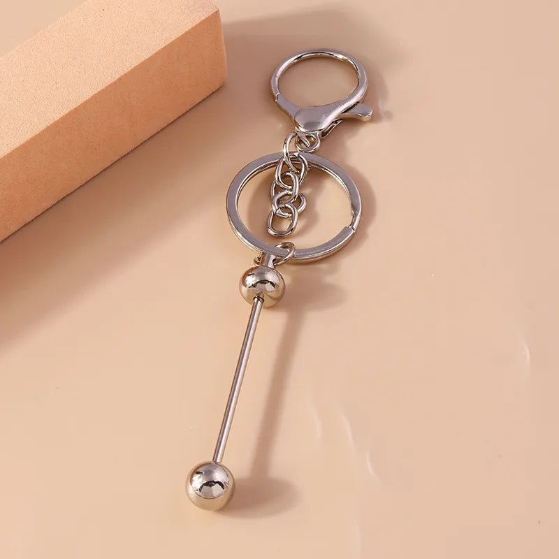 simple style solid color arylic zinc alloy keychain