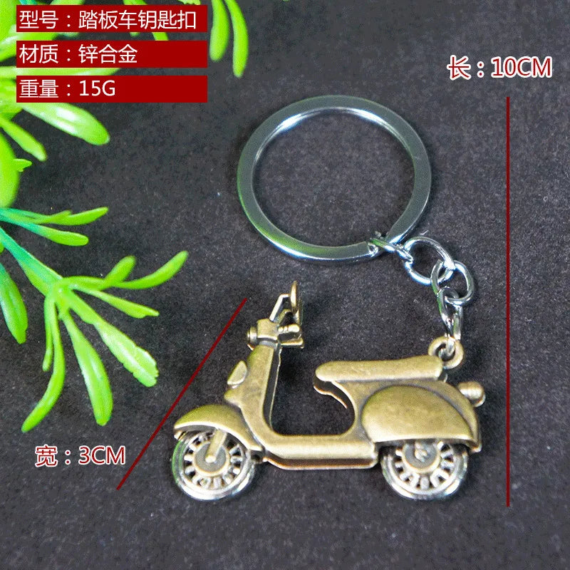 Factory sales metal simulation shell pistol tank aircraft hammer Bell ear spoon keychain uncle souvenir