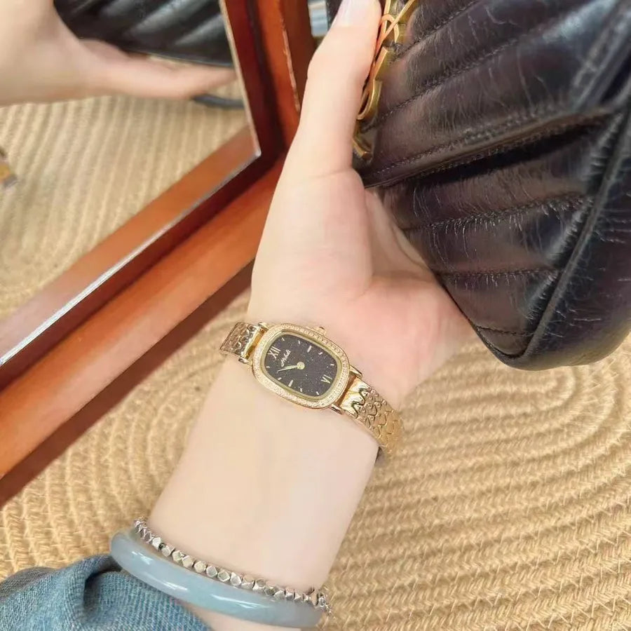 Gold Diamond Embedded Quartz Watch Elliptical Dial Starry Sky Ladies Fashionable Stainless Steel Strap Butterfly Buckle Clasp