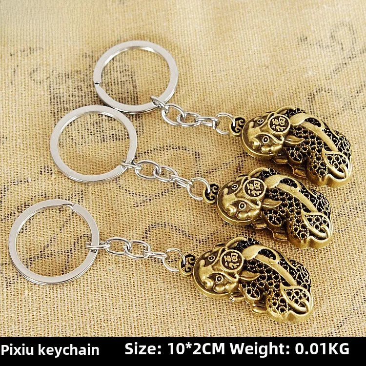 Factory sales metal simulation shell pistol tank aircraft hammer Bell ear spoon keychain uncle souvenir