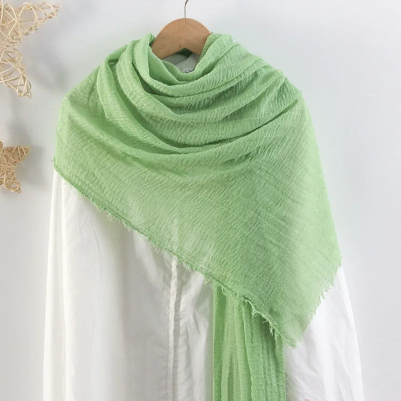 Hot selling solid color pleated cotton and linen scarf  women's bag headscarf crumpled hair fringe bubble scarf women's scarf cover head