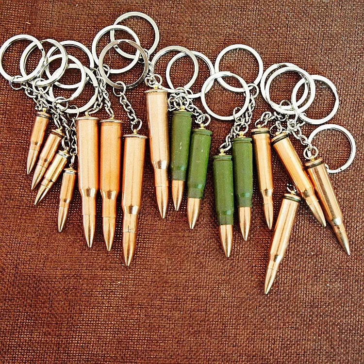 Factory sales metal simulation shell pistol tank aircraft hammer Bell ear spoon keychain uncle souvenir