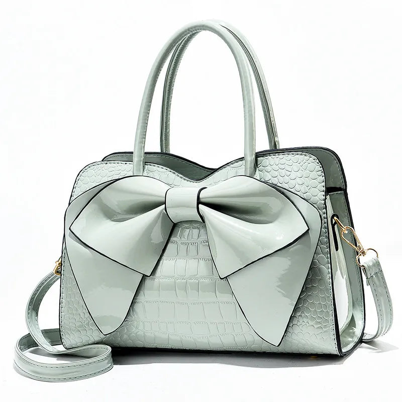 Women's Medium Pu Leather Bow Knot Classic Style Pillow Shape Zipper Handbag