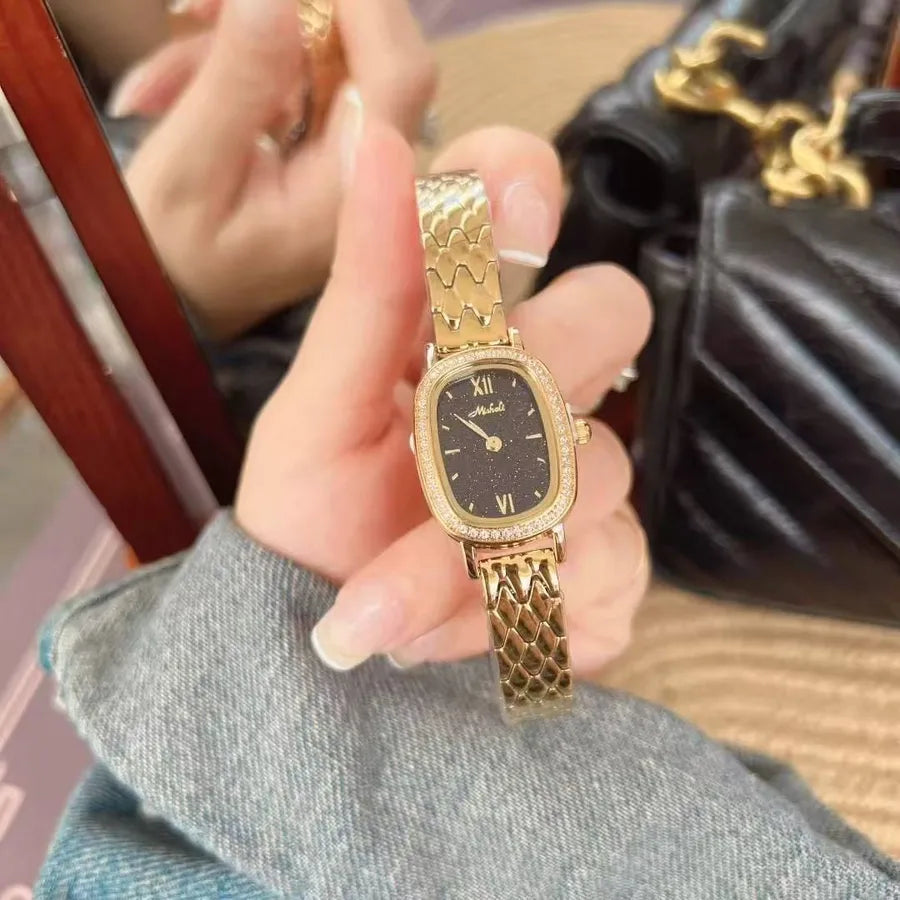 Gold Diamond Embedded Quartz Watch Elliptical Dial Starry Sky Ladies Fashionable Stainless Steel Strap Butterfly Buckle Clasp