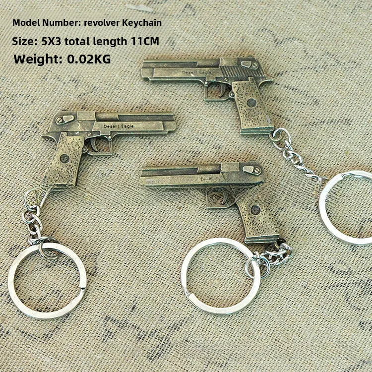 Factory sales metal simulation shell pistol tank aircraft hammer Bell ear spoon keychain uncle souvenir