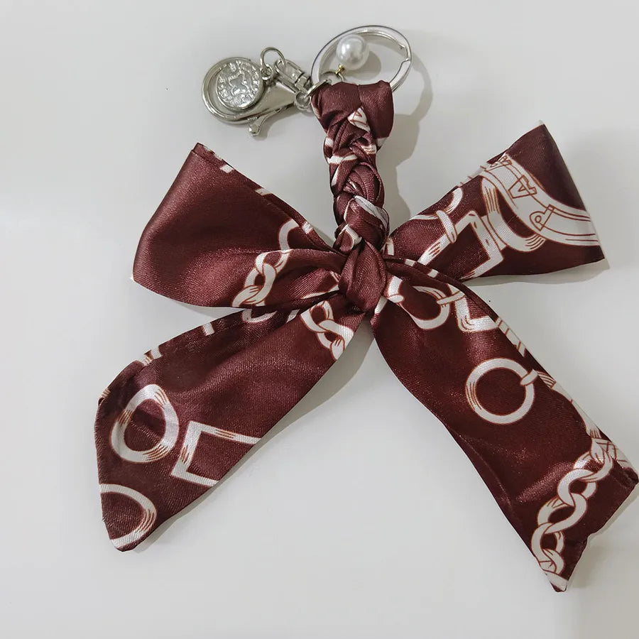 Sweet Simple Style Bow Knot Cloth Metal Unisex Bag Pendant Keychain