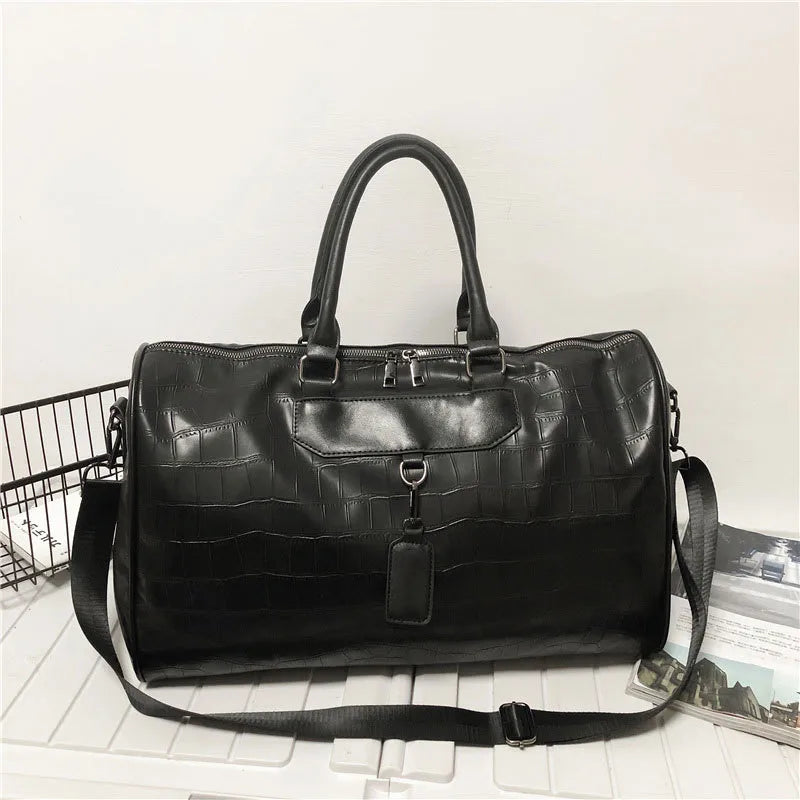 Spot soft leather pu stone pattern travel bag large capacity short travel portable luggage bag light boarding bag wholesale
