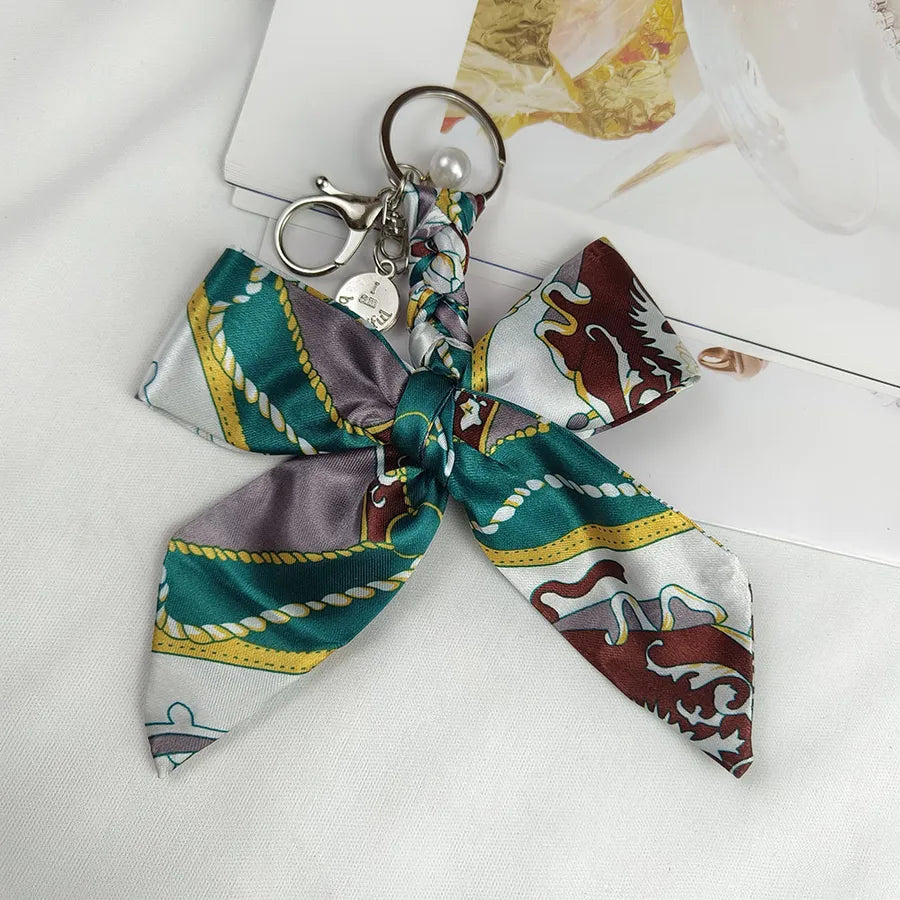 Sweet Simple Style Bow Knot Cloth Metal Unisex Bag Pendant Keychain