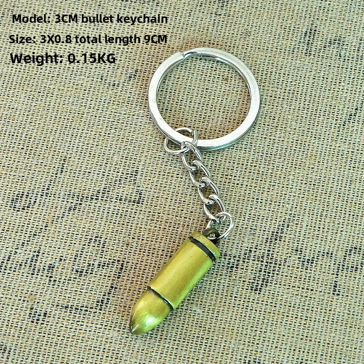 Factory sales metal simulation shell pistol tank aircraft hammer Bell ear spoon keychain uncle souvenir