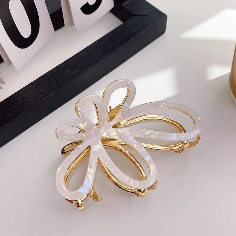 Women's Simple Style Butterfly Acetic acid sheets Hollow Out Hair Claws