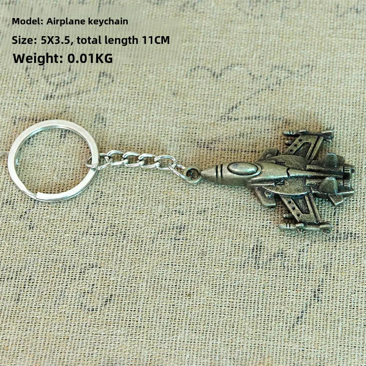 Factory sales metal simulation shell pistol tank aircraft hammer Bell ear spoon keychain uncle souvenir