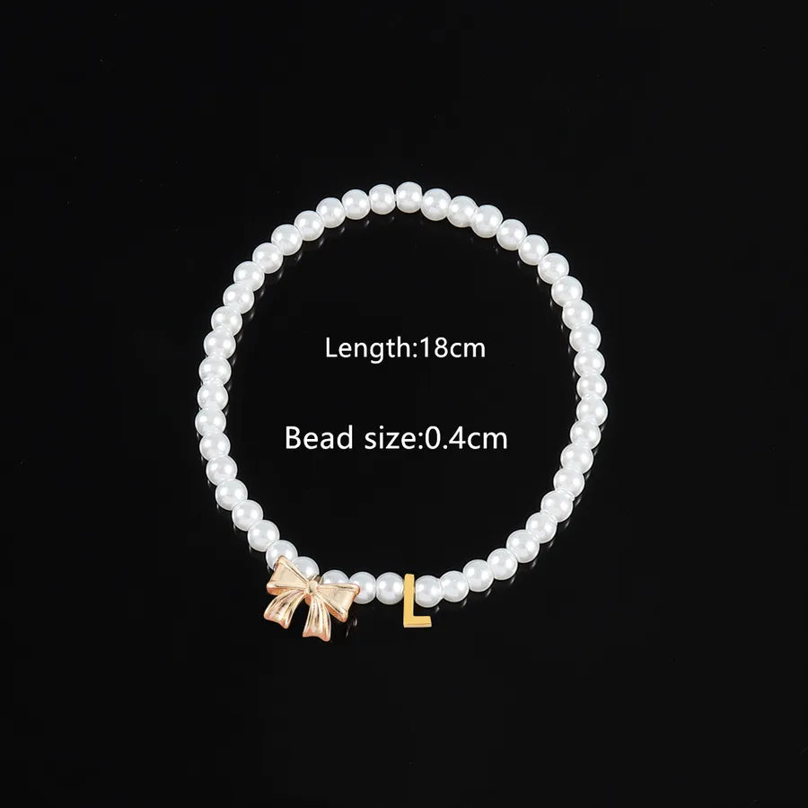 Elegant Classic Style Letter Bow Knot 304 Stainless Steel Artificial Pearl Copper Beaded Chain Beaded Bracelets Wholesale