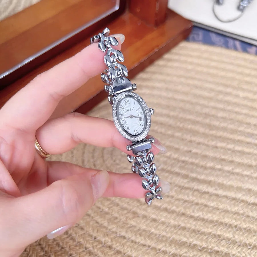 Fashionable Waterproof Quartz Women's Watch Mini Elliptical Dial Diamond Embedded Gold Hand Chain Stainless Steel Strap