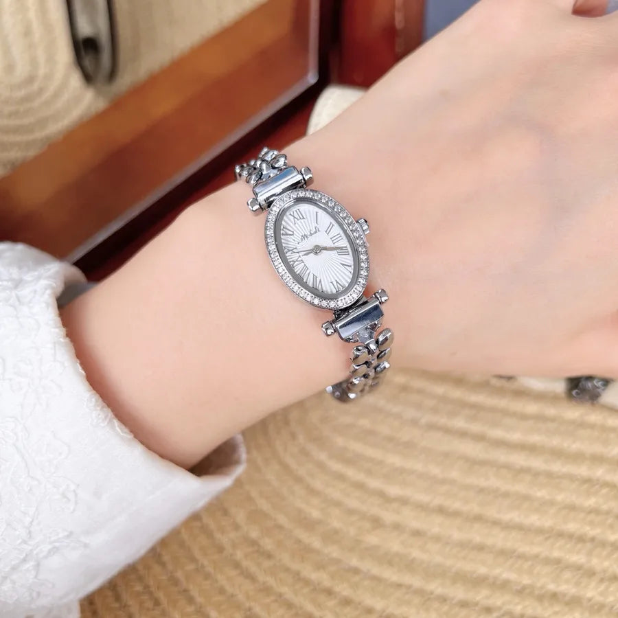 Fashionable Waterproof Quartz Women's Watch Mini Elliptical Dial Diamond Embedded Gold Hand Chain Stainless Steel Strap