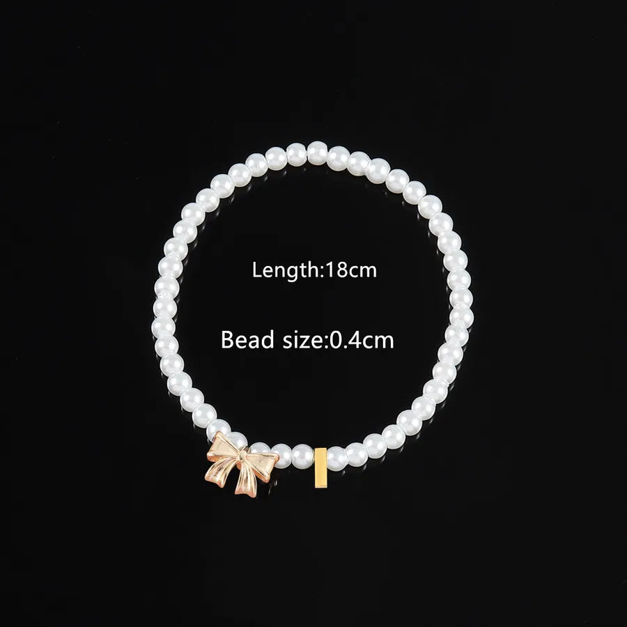 Elegant Classic Style Letter Bow Knot 304 Stainless Steel Artificial Pearl Copper Beaded Chain Beaded Bracelets Wholesale