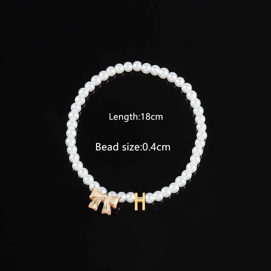 Elegant Classic Style Letter Bow Knot 304 Stainless Steel Artificial Pearl Copper Beaded Chain Beaded Bracelets Wholesale