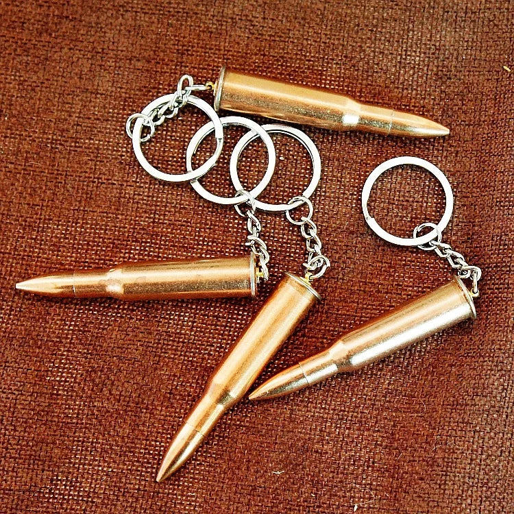 Factory sales metal simulation shell pistol tank aircraft hammer Bell ear spoon keychain uncle souvenir
