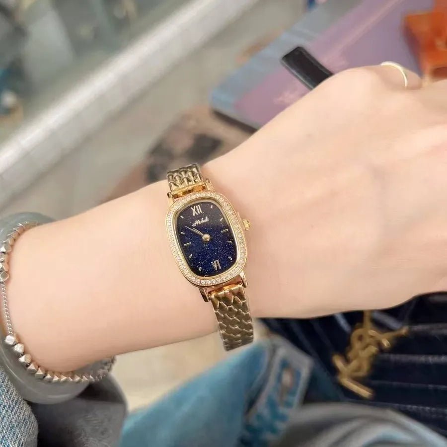 Gold Diamond Embedded Quartz Watch Elliptical Dial Starry Sky Ladies Fashionable Stainless Steel Strap Butterfly Buckle Clasp