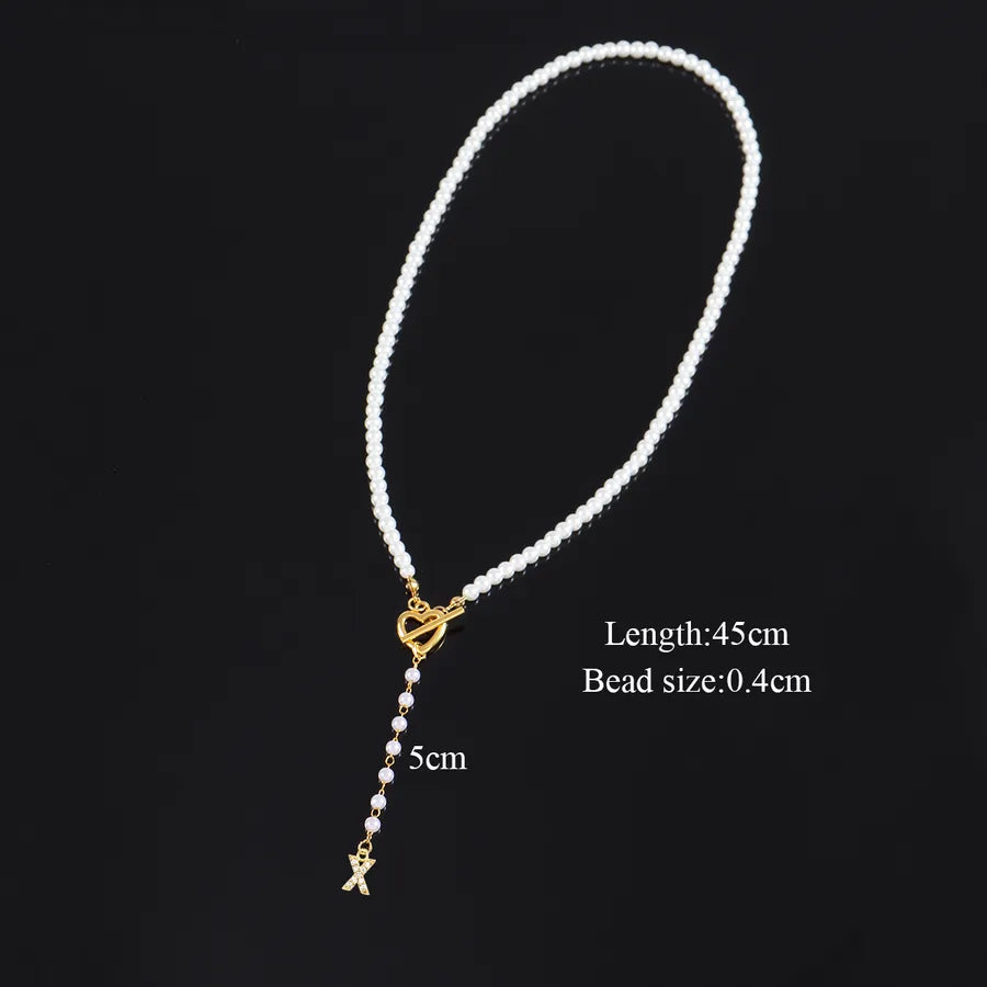Elegant Classic Style Letter Heart Shape Artificial Pearl Copper Beaded Chain OT Clasp Toggle Clasp Closure Beaded Necklaces Wholesale