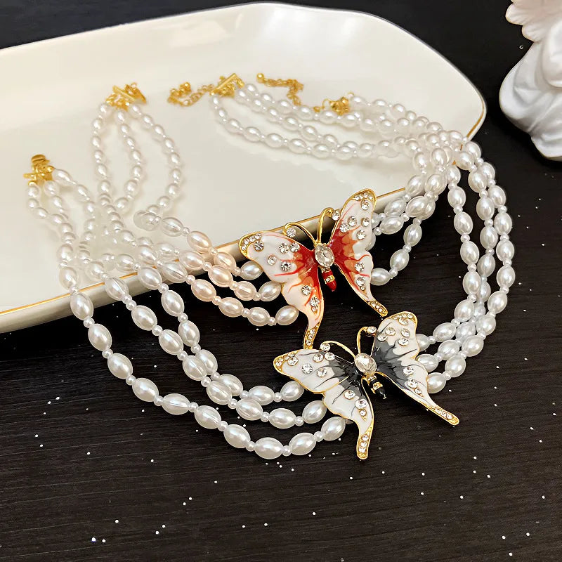 Vacation Classic Style Butterfly Imitation Pearl Alloy Beaded Chain Beaded Necklaces Wholesale