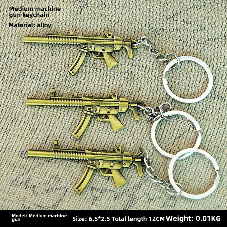 Factory sales metal simulation shell pistol tank aircraft hammer Bell ear spoon keychain uncle souvenir