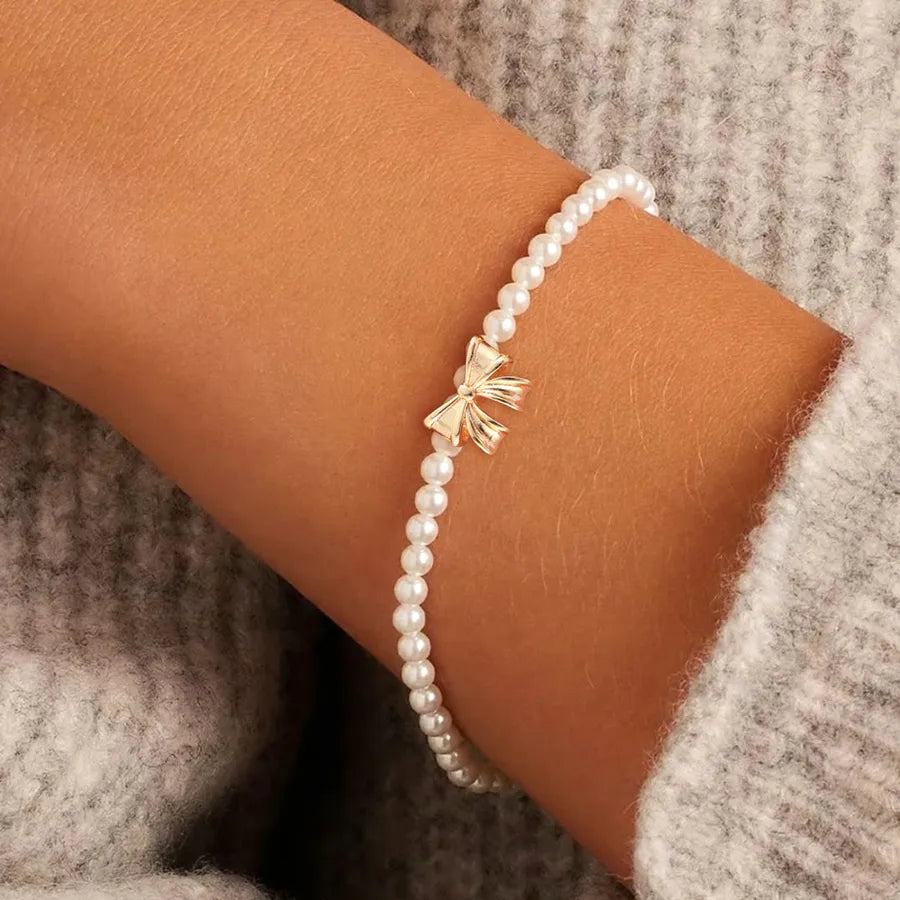 Elegant Simple Style Classic Style Bow Knot Artificial Pearl Copper Beaded Chain Beaded Bracelets Wholesale