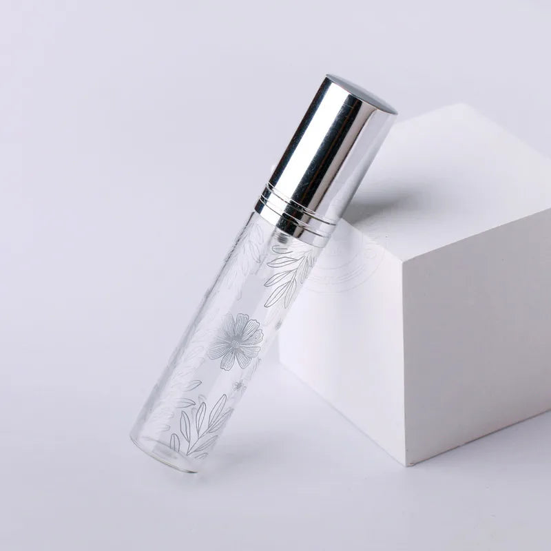 Wholesale 10ml printed leaf spray bottle printed glass perfume bottle with logo sub-bottling portable small sample bottle