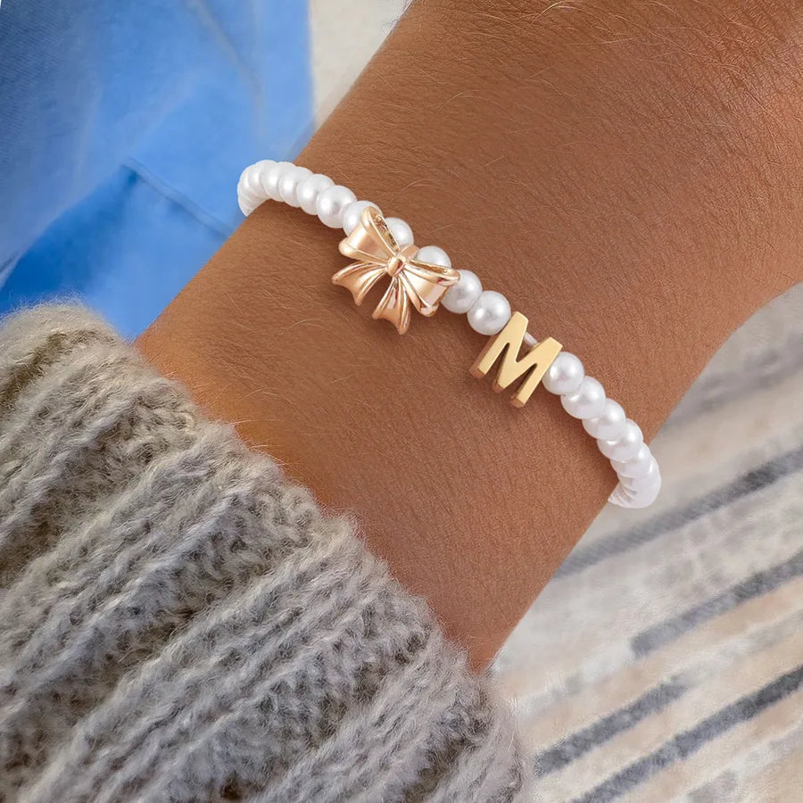 Elegant Classic Style Letter Bow Knot 304 Stainless Steel Artificial Pearl Copper Beaded Chain Beaded Bracelets Wholesale