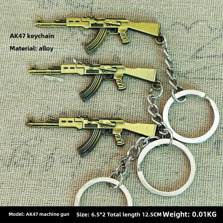 Factory sales metal simulation shell pistol tank aircraft hammer Bell ear spoon keychain uncle souvenir